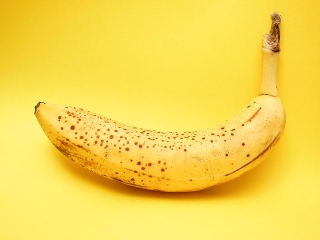 Banana on yellow background