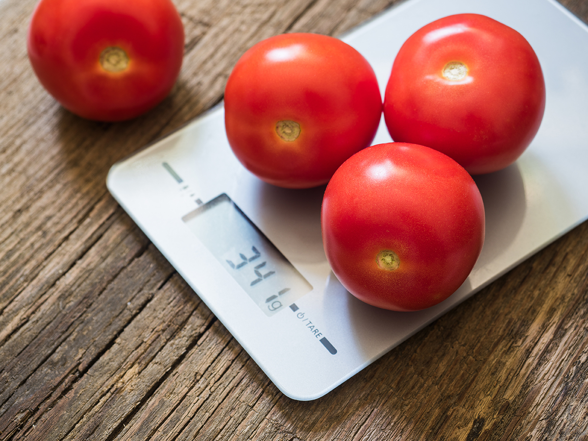 Lycopene-rich tomatoes on a scale