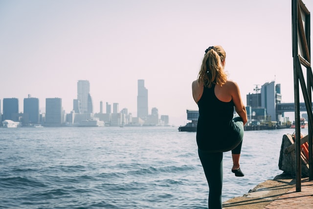 woman stretching and getting ready for exercise