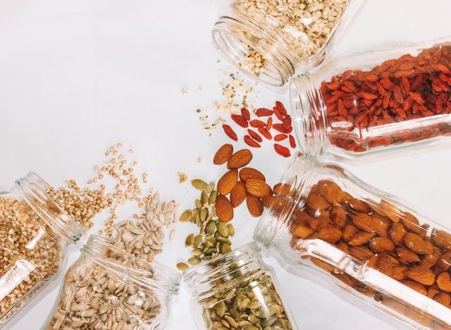 Nuts and seeds rich in Omega-3 in glass containers