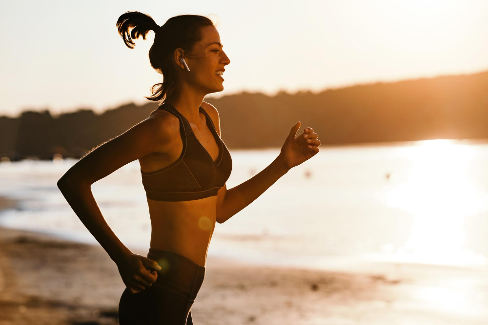 woman running contributing to better bone health