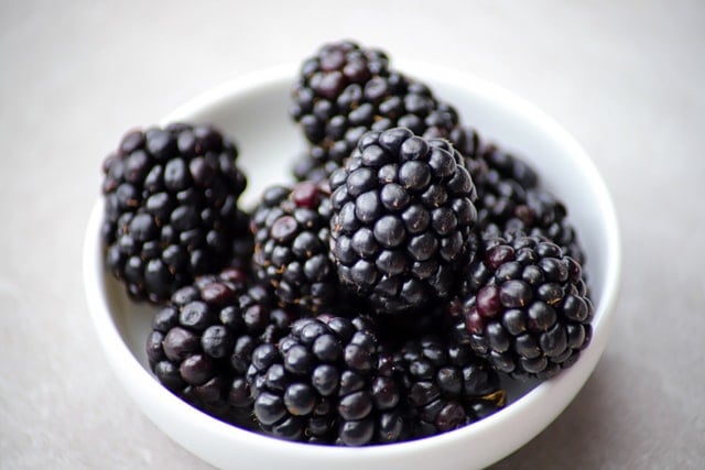 A bowl of antioxidant rich blackberries with a high orac score.