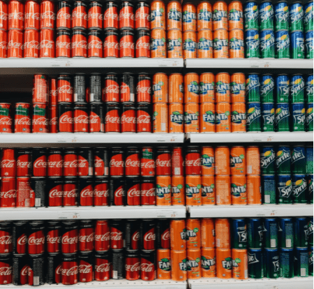 A supermarket isle of name-brand soft drinks